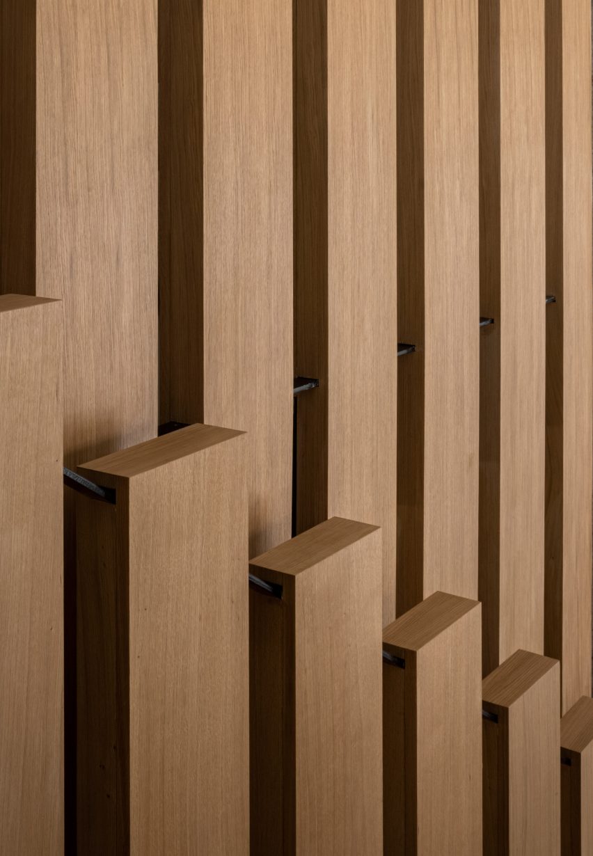 Oak staircase features in Notabene shoe store designed by Norm Architects
