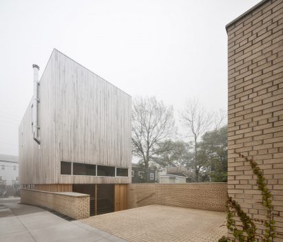 Main entrance via a brick courtyard