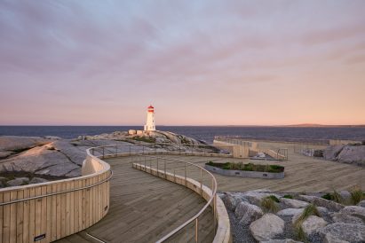 Walkways facing the lighthouse at sunset