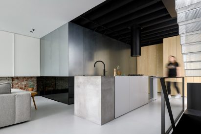 Living area inside Reflections of the Past loft in Amsterdam by Firm Architects