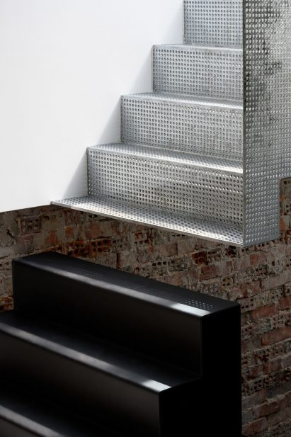 Staircase inside Reflections of the Past loft in Amsterdam by Firm Architects