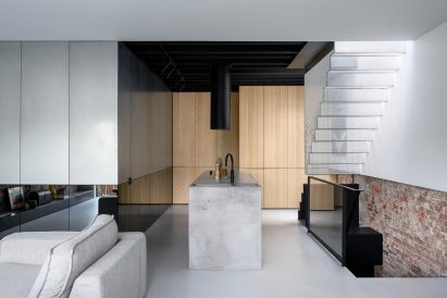 Living area inside Reflections of the Past loft in Amsterdam by Firm Architects