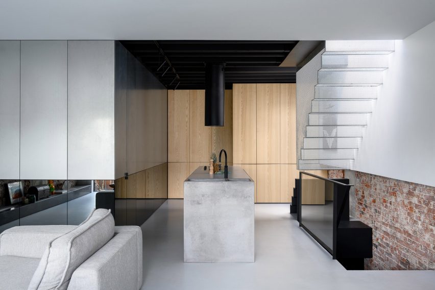 Living area inside Reflections of the Past loft in Amsterdam by Firm Architects