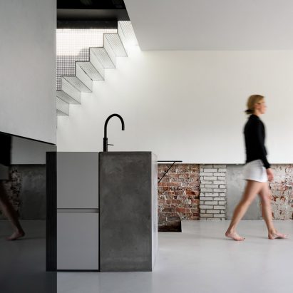 Living area inside Reflections of the Past loft in Amsterdam by Firm Architects