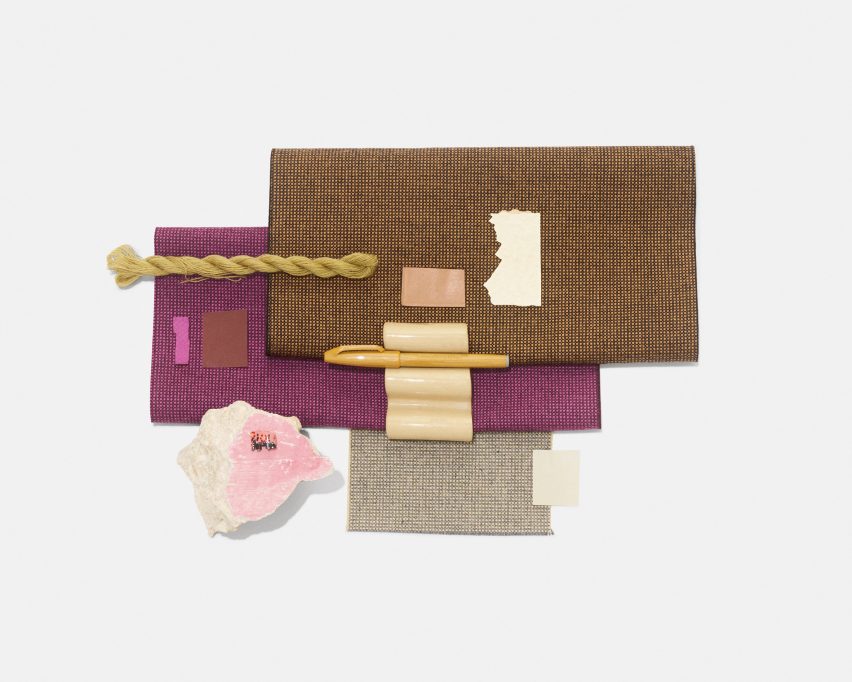 Swatches of Kvadrat's Sabi textile upholstery in a rich magenta and woody brown colour