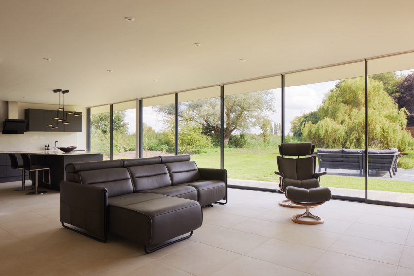 Living room in Facade of Sayang House by Carlos Gris