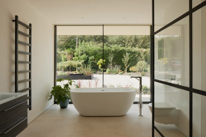 Bathroom in Facade of Sayang House by Carlos Gris