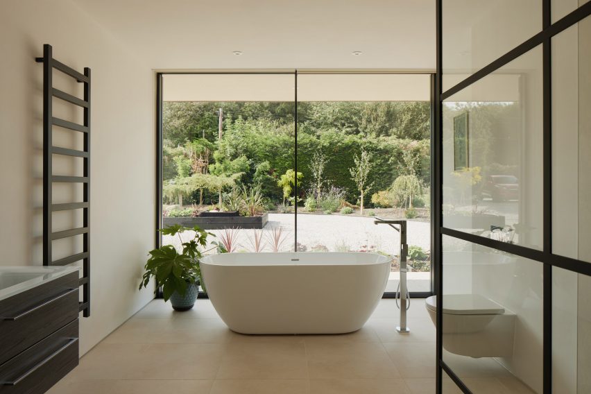 Bathroom in Facade of Sayang House by Carlos Gris