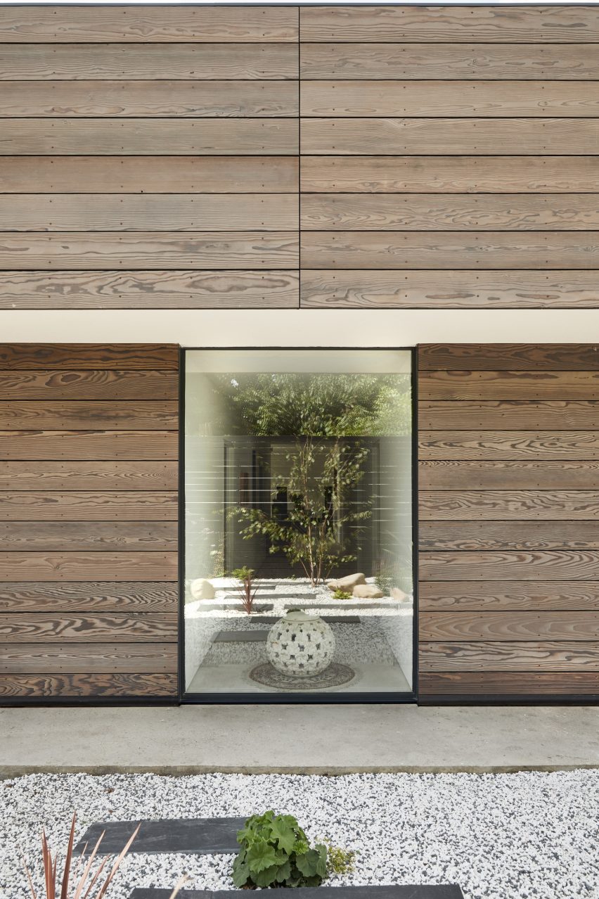 Window to corridor in Facade of Sayang House by Carlos Gris