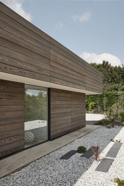 Sie elevation of Facade of Sayang House by Carlos Gris