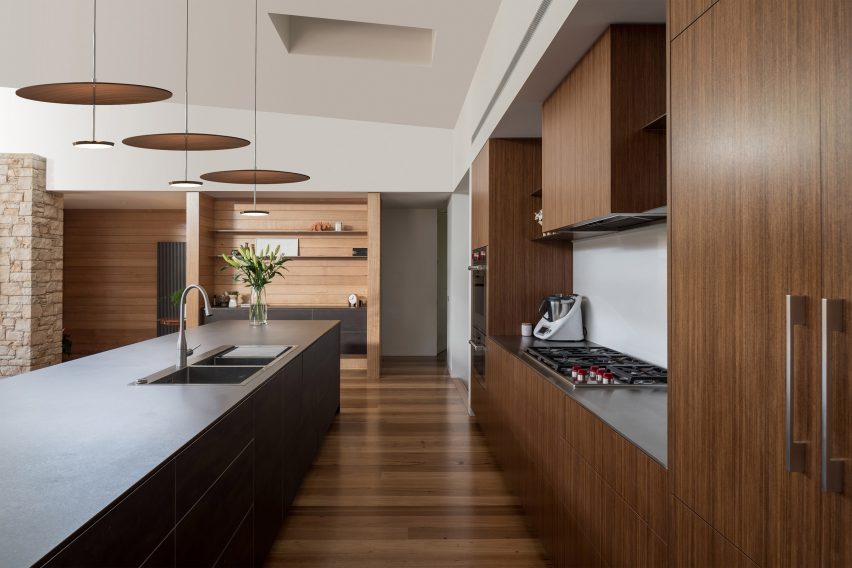 Pablo Design's Sky Dome pendant lights suspended in a contemporary kitchen interior