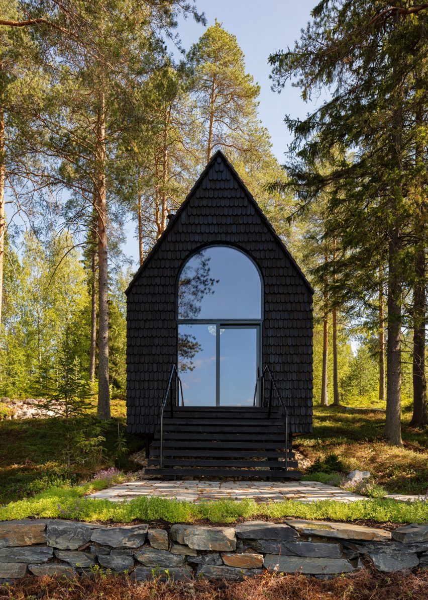 Black woodland cabin