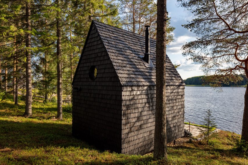Black lakeside cabin