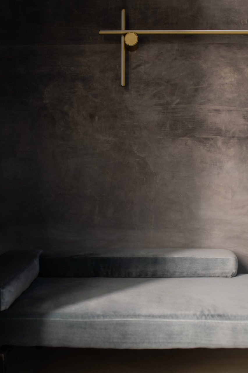 Dedar's Elektra velvet fabric in a light grey-blue used to upholster a sofa