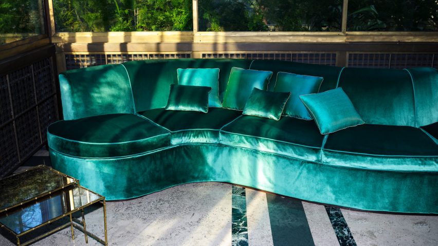 Dedar's Splendido fabric in a rich turquoise used to upholster a sofa
