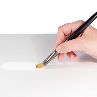 A white hand painting with Stuart Semple's white paint
