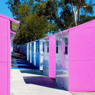 Pink-sided units at Whitsett West Tiny Home Village
