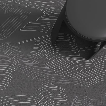 A photograph taken from above of 3D carpet, which was presented on Dezeen Showroom, with a black stool