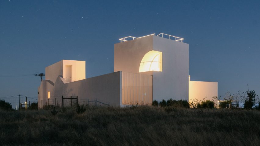 Geometric openings and cut outs are lit at night