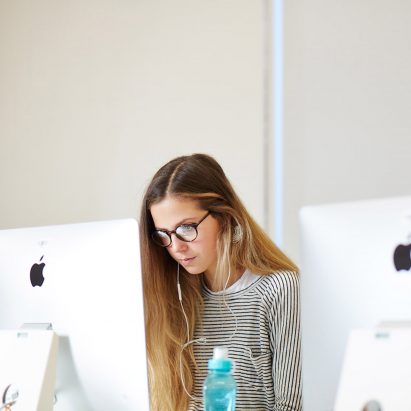 Student working at a desktop computer