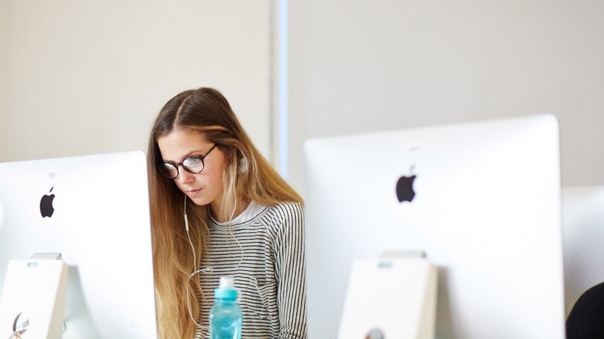 Student working at a desktop computer