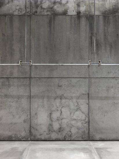 Walls have a cracked and distressed look at the Balenciaga Berlin store
