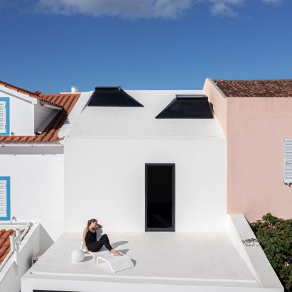 Windmill House has a white washed exterior