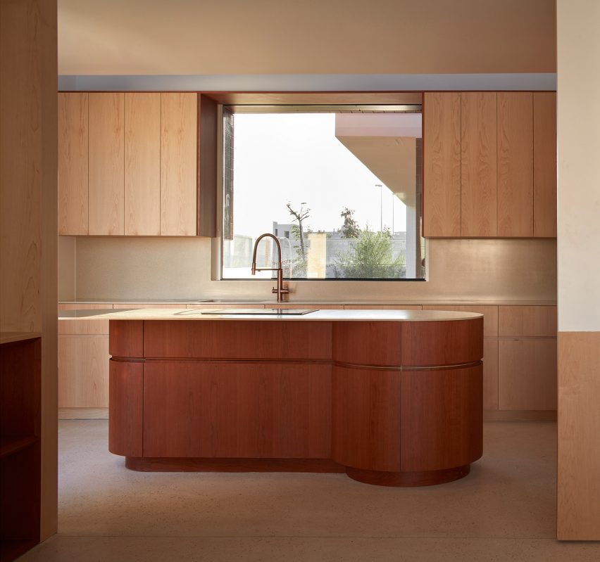 Kitchen with red island