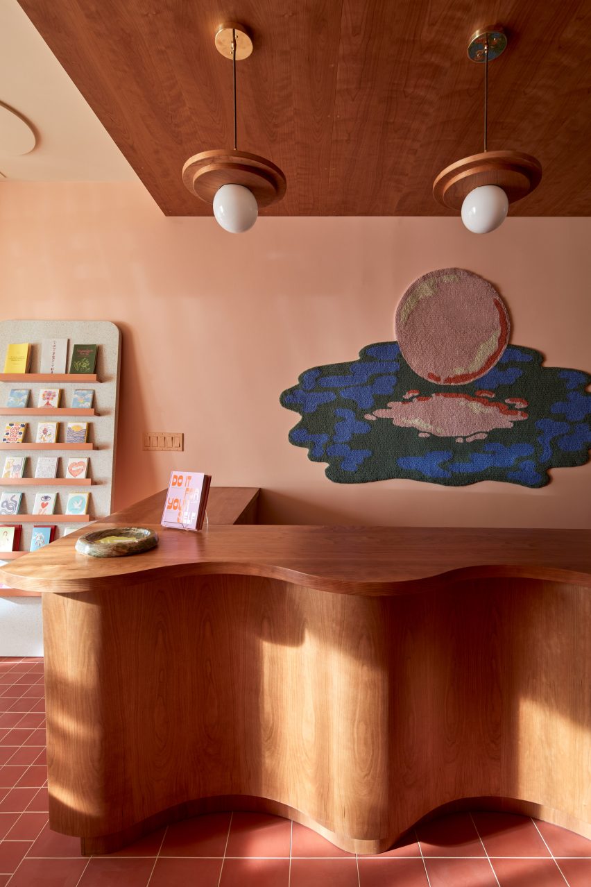 Undulating wooden counter in lifestyle store