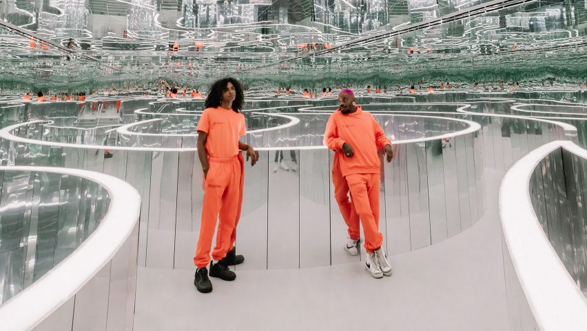 Two men in orange co-ord loungewear