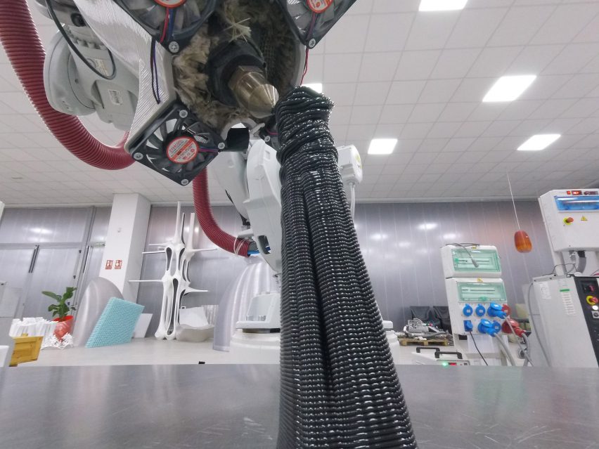 A trophy being contructed from ocean plastic