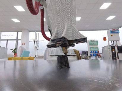 A machine 3D-printing the Fashion Awards 2021 trophies