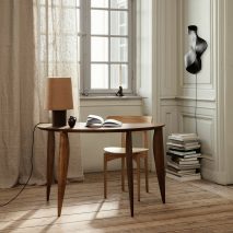 Feve desk set in a light room with wooden floors