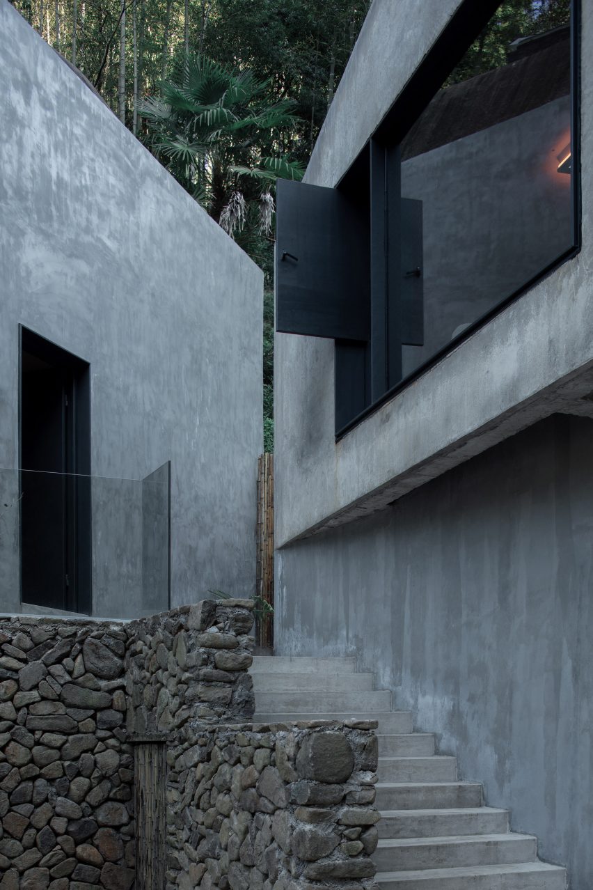 Concrete guesthouses at Flowing Cloud Township Villa