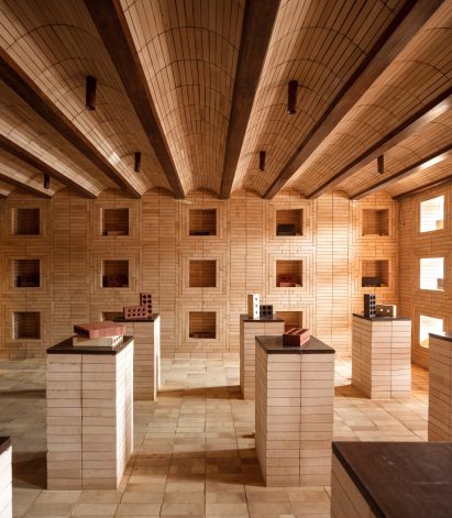 Interior of New Delhi showroom designed by Renesa with bricks displayed on plinths made from bricks