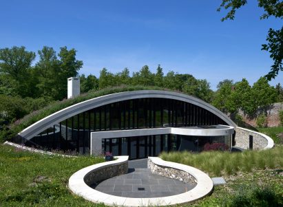 House with CLT-arch roof by Kirkland Fraser Moor 