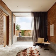 A bedroom looking out onto countryside