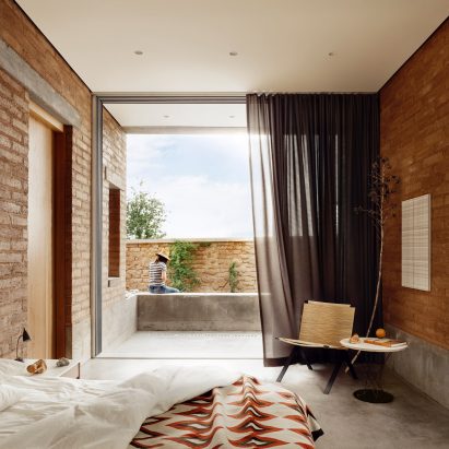 A bedroom looking out onto countryside