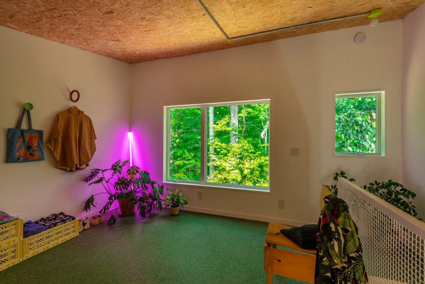 Upstairs bedroom with laminated strand lumber walls