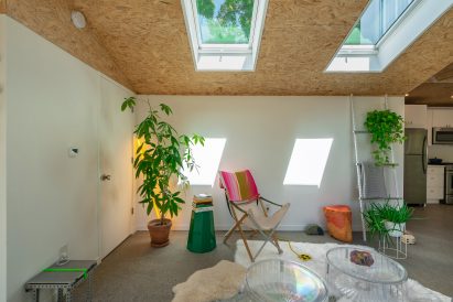 White walls and concrete flooring inside steel home