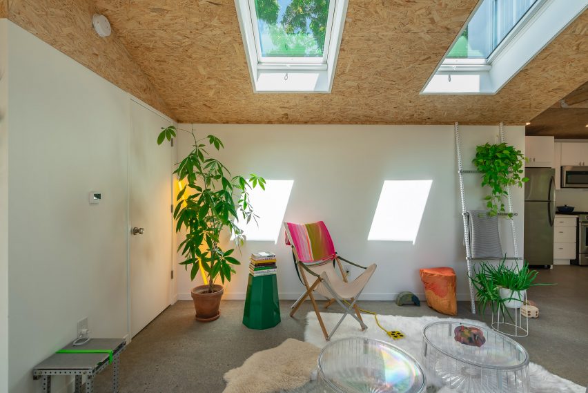 White walls and concrete flooring inside steel home