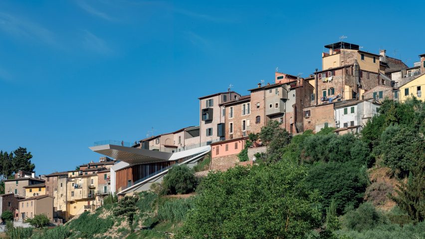 Cantilevered terrace adjoins 14th-century townhouses overhauled by Mario Cucinella Architects