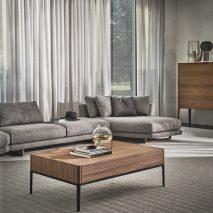 A living room with furniture by Porada