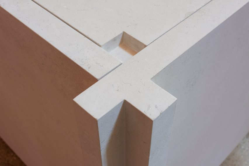 Cross-shaped detail on the corner of St John Chrysostom Church's limestone altar