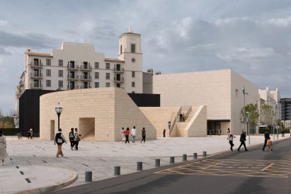 The exterior of the sand coloured Aranya Theatres