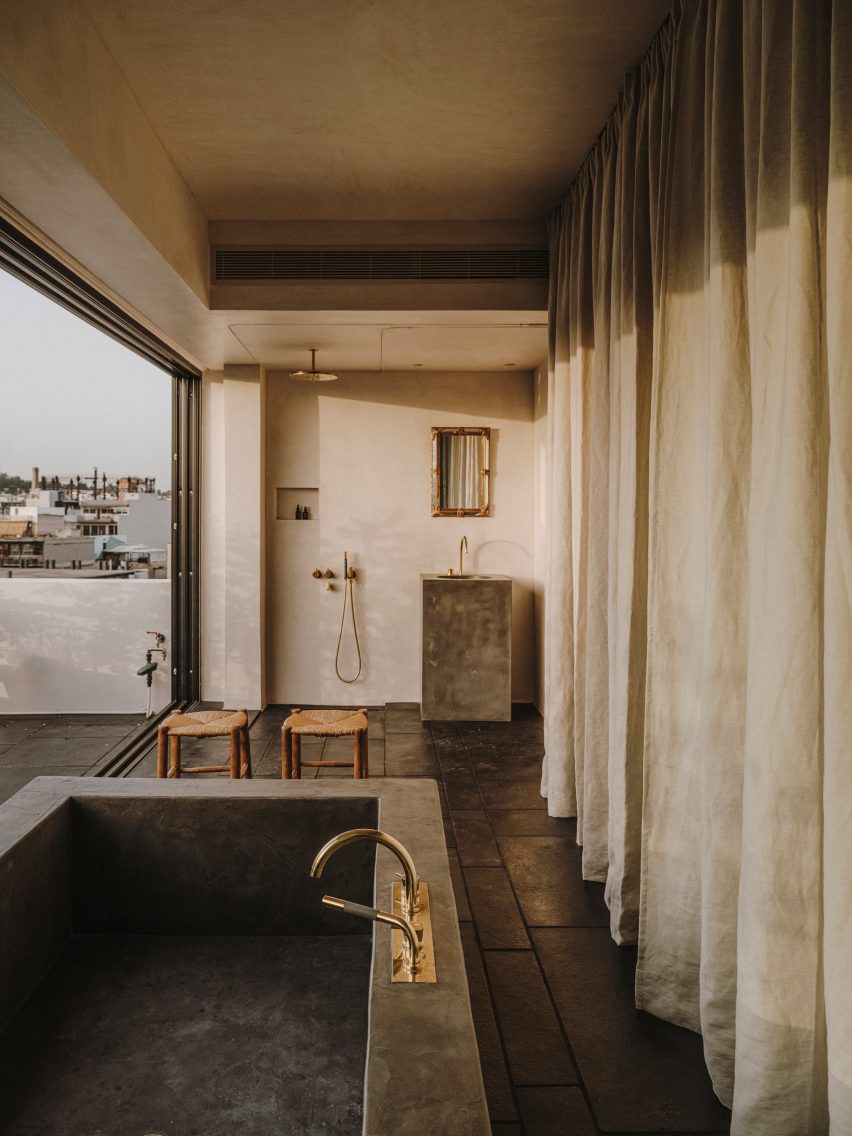 Studio Andrew Trotter design event space and penthouse inside Athens' 10AM Lofts