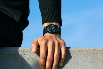 A photograph of the black Ressence watch with honeycomb strap