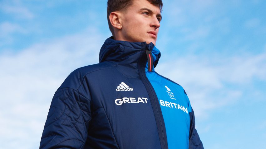 A man wearing a blue Adidas jacket