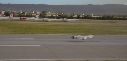 AirCar takes off from an airport runway