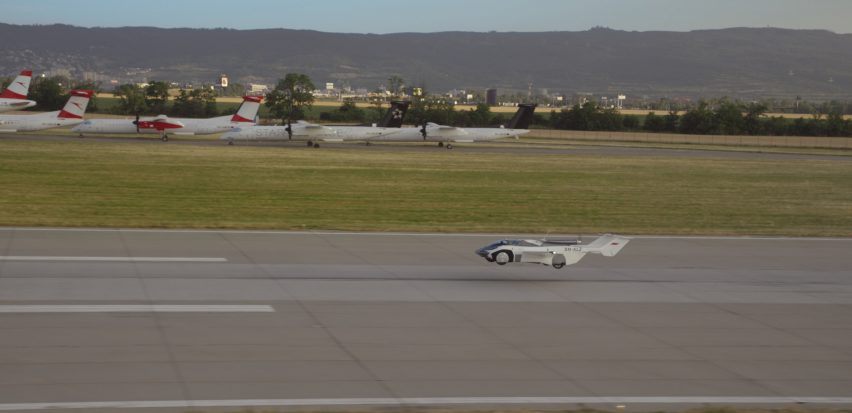 AirCar takes off from an airport runway